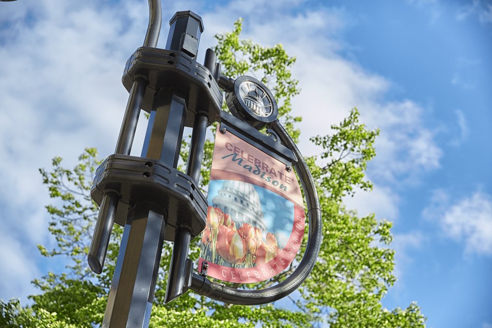 A street sign reading Celebrate Madison.