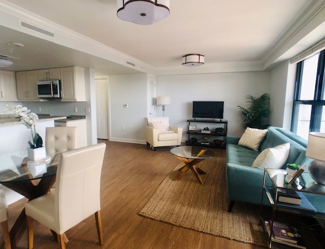 A living room in a Heights floor plan.